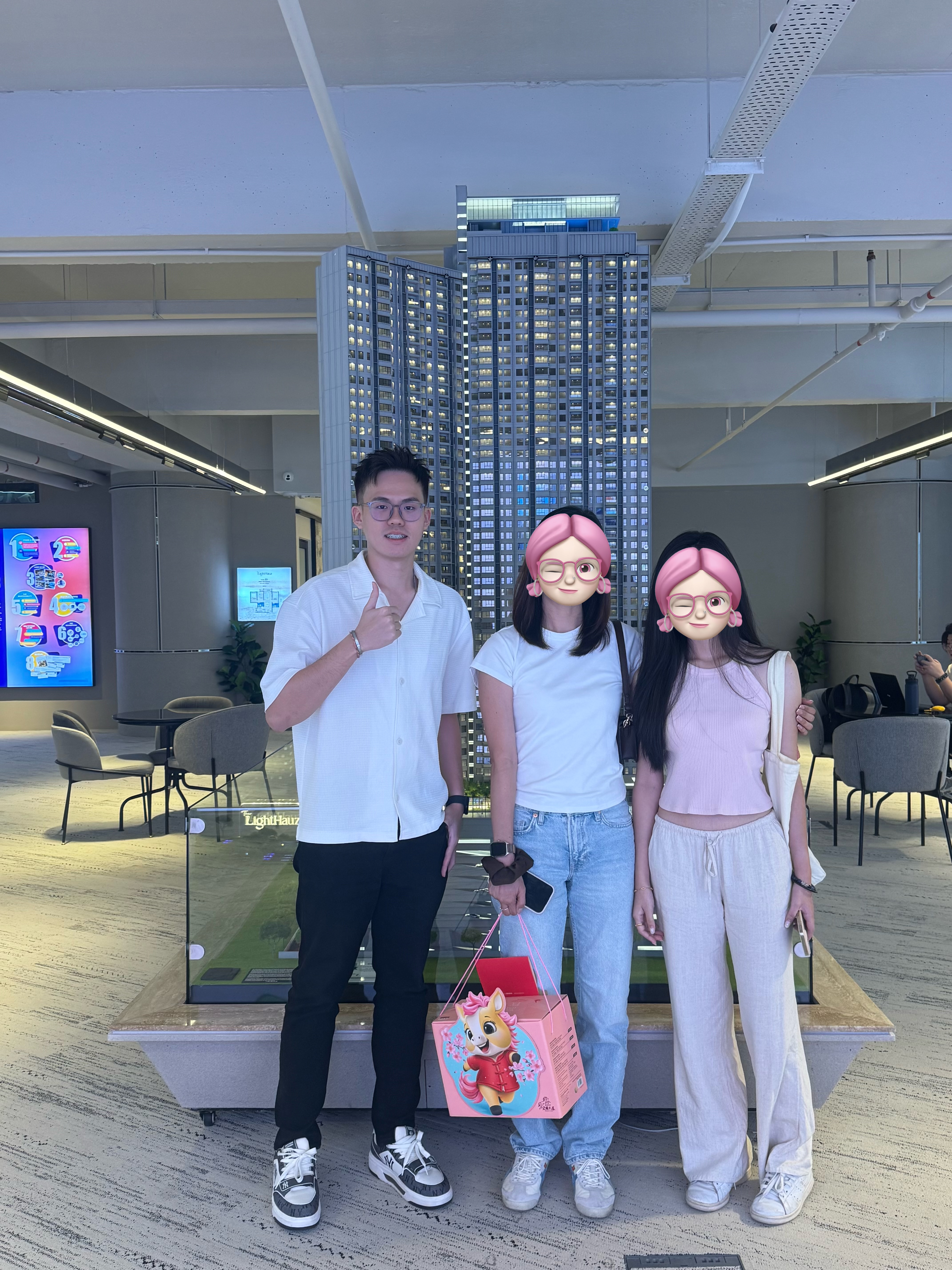 James with clients at a property showroom