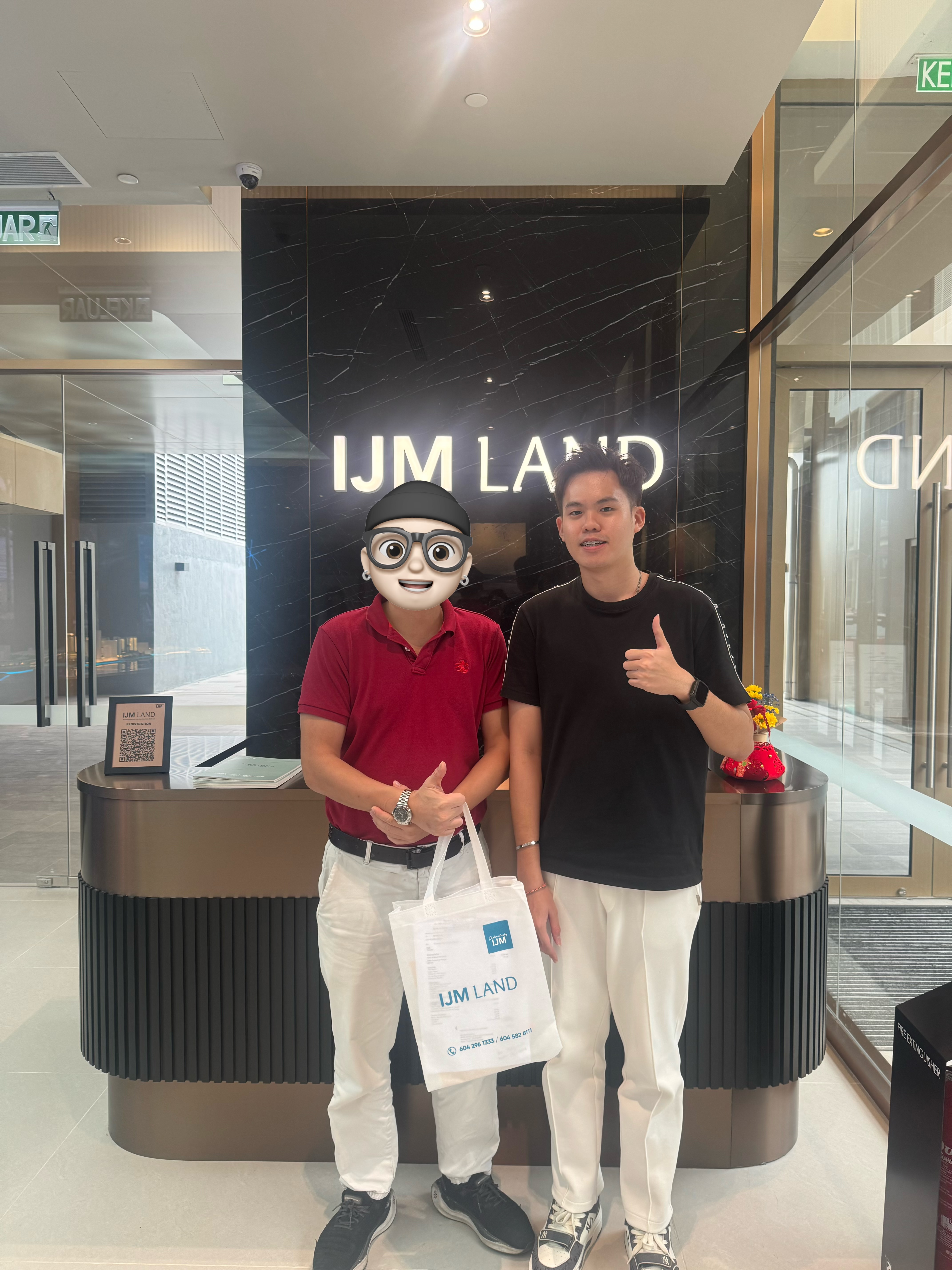 James with a client at an IJM Land property handover